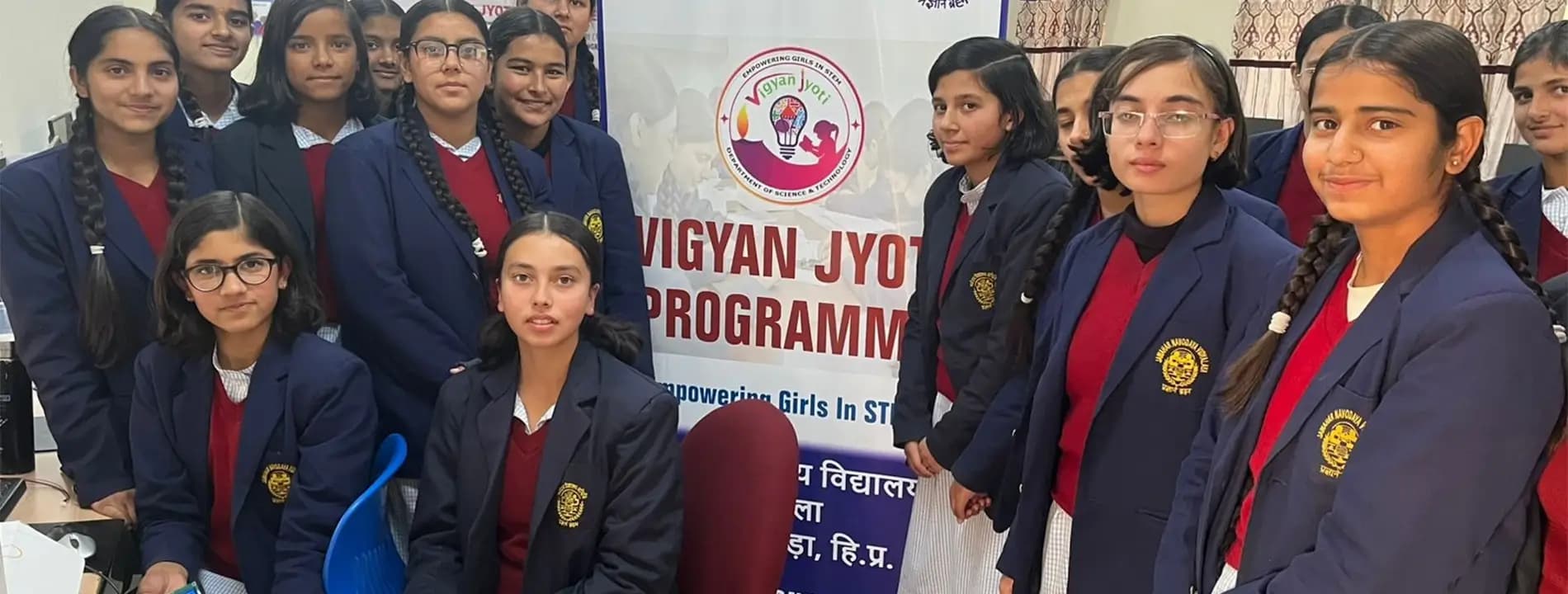 Educators guiding students through AI and STEM lab experiences at school